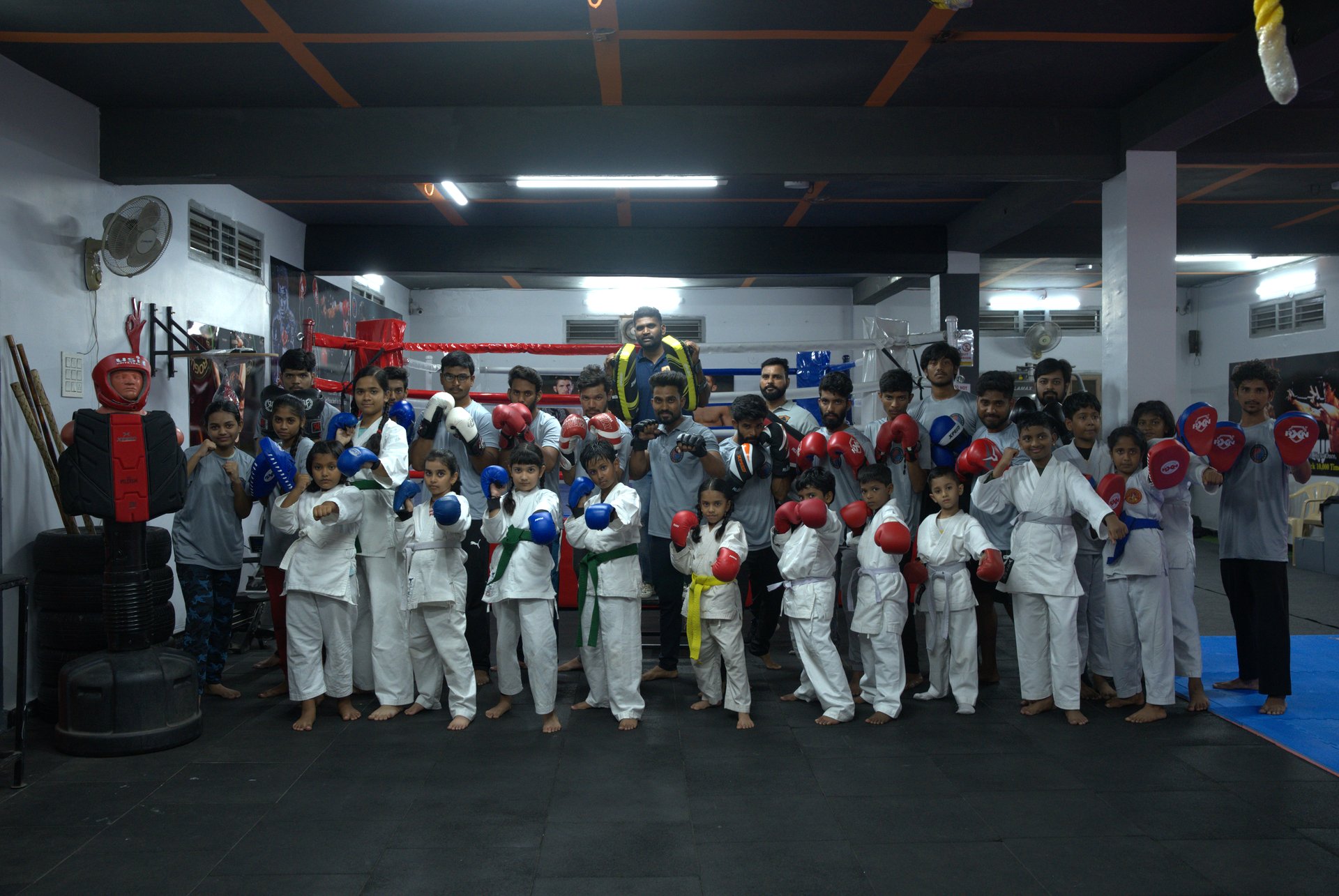 UMF batch group photo in the boxing ring